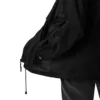 Coupe-vent Radée – Détail poche et in-bag Coupe-vent Radée Estey nylon, détail poche intérieure zippée et système in-bag pliable