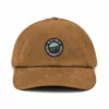 Casquette Le Cap Estey velours côtelé camel – face Casquette Le Cap Estey velours côtelé camel vue de face, texture côtelée et écusson brodé